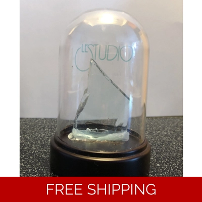 Piece of Le Studio Round Display Box with Piece of Glass from the recording room